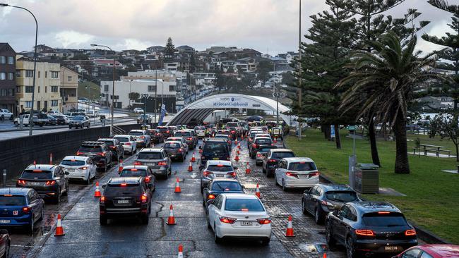 Cars line up at a Covid testing site at Sydney’s Bondi Beach. Picture: NCA NewsWire / Flavio Brancaleone