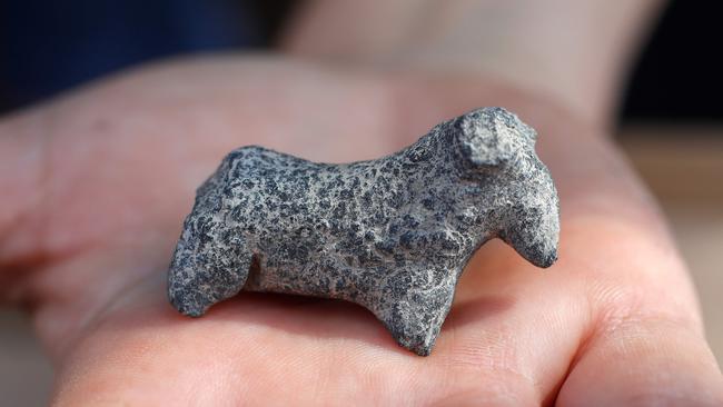 Another figurine found in the remains of the temple. Picture: AFP