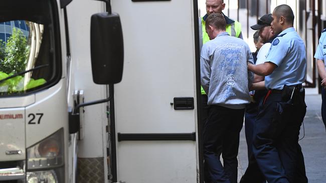 Shane Robertson (left) leaves the Supreme Court after being jailed for murdering Katie Haley. Picture: James Ross