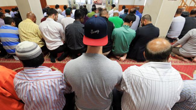 Muslim men attend prayers at Parramatta Mosque in Sydney. Picture: Craig Greenhill