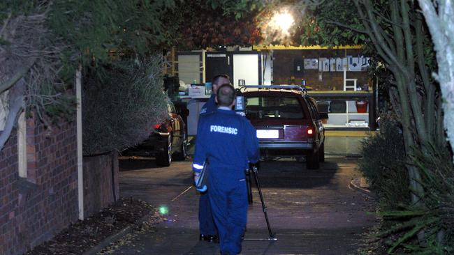 Police at the scene of the Hodson executions.