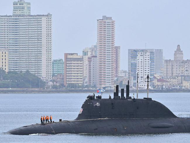 The Russian nuclear-powered submarine Kazan, part of the Russian naval detachment visiting Cuba, arrive at Havana's harbour, June 12, 2024. The Russian nuclear-powered submarine Kazan -- which will not be carrying nuclear weapons -- and three other Russian naval vessels, will dock in the Cuban capital from June 12-17. The unusual deployment of the Russian military so close to the United States -- particularly the powerful submarine -- comes amid major tensions over the war in Ukraine, where the Western-backed government is fighting a Russian invasion. (Photo by ADALBERTO ROQUE / AFP)