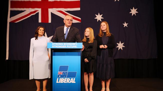 Scott Morrison, flanked by his wife Jenny Morrison and daughters Lily Morrison and Abbey Morrison concedes defeat. Picture: Asanka Ratnayake/Getty Images