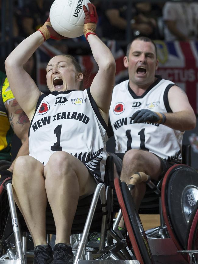 Kelly Whittle of NZ scores during the Wheelchair Rugby event between Australia and New Zealand at the Invictus Games. Picture: AAP Image/Craig Golding