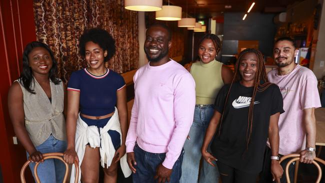 Little Lagos owner, Ade (centre), and his staff at his Nigerian restaurant. Picture: Justin Lloyd