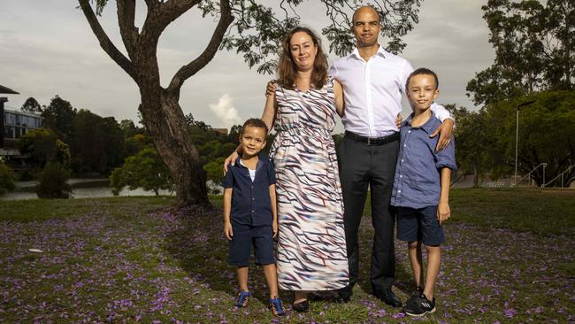 Harriet Swatman and Thuthuka Manasa with their sons Matobo and Magnus at St Lucia in Brisbane. Picture: Glenn Hunt