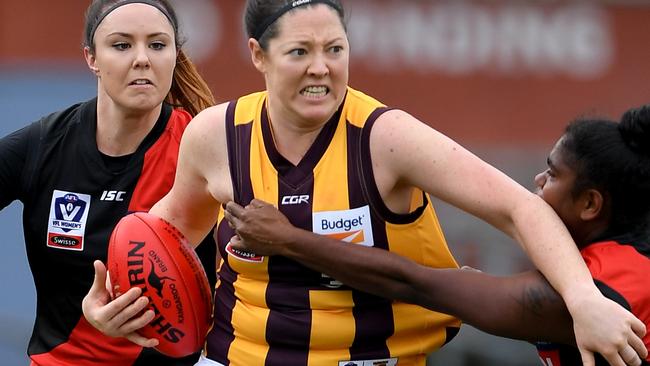 Jessica Sibley and 31 in action during the VFLW Essendon v Hawthorn football match  in Essendon, Saturday, June 15, 2019. Picture: Andy Brownbill