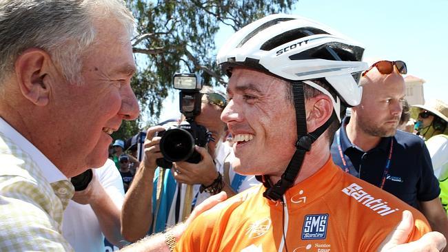 Orica GreenEDGE owner Gerry Ryan congratulates Simon Gerrans on his overall Ochre jersey win.