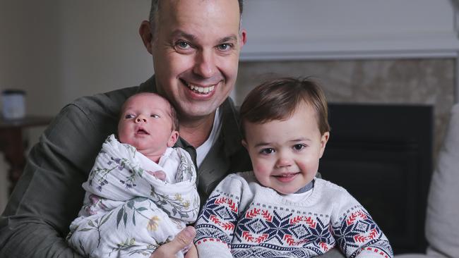 Zarko Milicevic with son Leo, 20 months, and two-week-old daughter Millie. Picture: Wayne Taylor