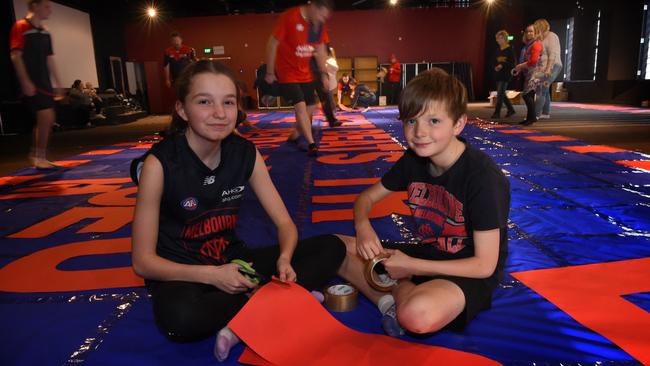 Melbourne fans Taylah (13) and Jack Munro (10). Picture: Tony Gough