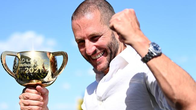 Brae Sokolski with the 2021 Melbourne Cup trophy won by Verry Elleegant. Picture: Getty Images