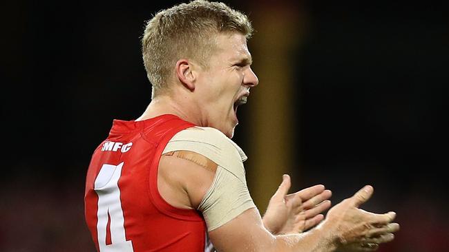 SYDNEY, AUSTRALIA — APRIL 07: Dan Hannebery of the Swans celebrates a goal during the round three AFL match between the Sydney Swans and the Collingwood Magpies at Sydney Cricket Ground on April 7, 2017 in Sydney, Australia. (Photo by Ryan Pierse/Getty Images)