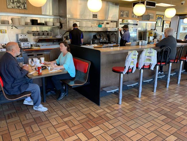 Customers sit for breakfast at a Waffle House in Atlanta. Picture: AFP