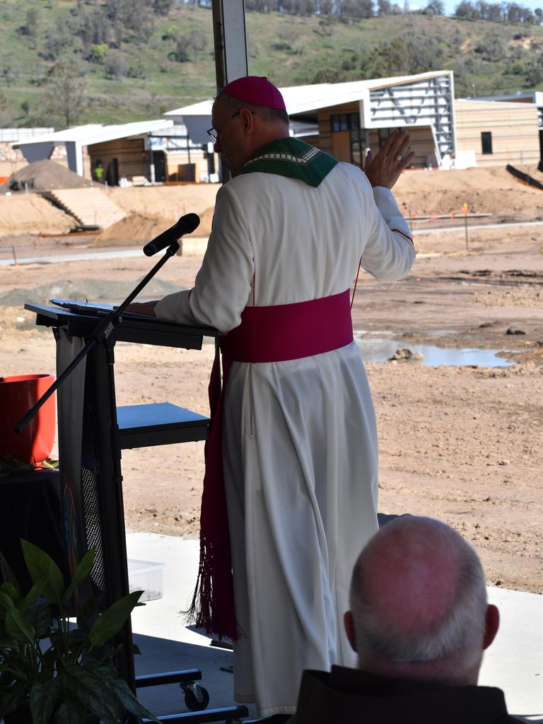 Reverend Ken Howell, Auxiliary Bishop of Brisbane blesses the soil of Sophia College