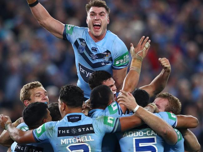 ANZ - 2018 Year In Focus SYDNEY, AUSTRALIA - JUNE 24:  Angus Crichton of the Blues and team mates celebrate winning game two of the State of Origin series between the New South Wales Blues and the Queensland Maroons at ANZ Stadium on June 24, 2018 in Sydney, Australia.  (Photo by Cameron Spencer/Getty Images)