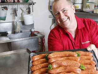 Owner of Circle T Meats Barnie Nolan with his award-winning sausages at his Raceview butcher shop. . Picture: Sarah Harvey