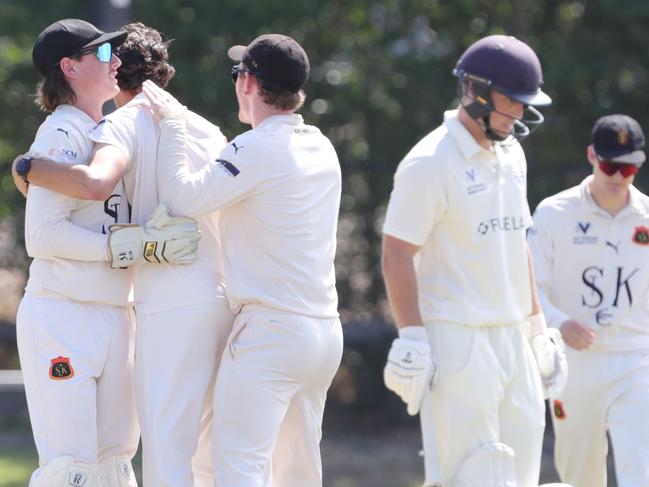 Luke Destito (second from left) celebrates a wicket against the Cats. Picture: Mark Wilson