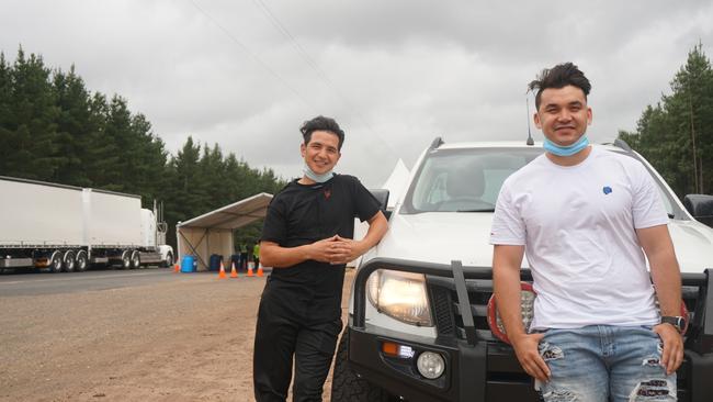 Melbourne's Sharrif Mohammad and Amanullah Haidari at the Princess Highway border checkpoint excited to travel to South Australia for the first time. Picture: Jessica Ball