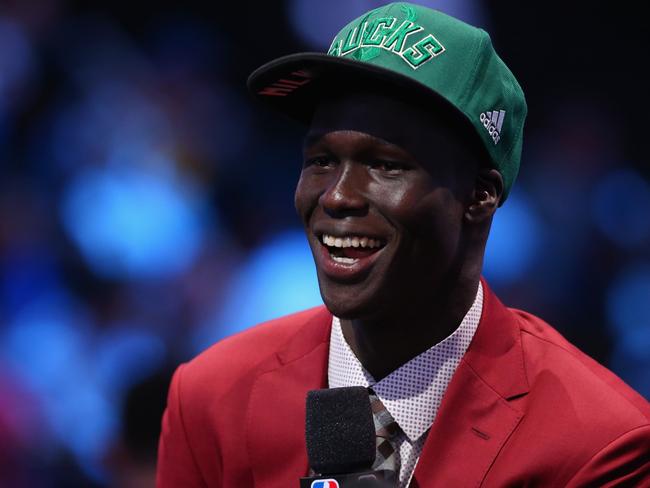 NEW YORK, NY - JUNE 23: Thon Maker smiles during his interview after being drafted 10th overall by the Milwaukee Bucks in the first round of the 2016 NBA Draft at the Barclays Center on June 23, 2016 in the Brooklyn borough of New York City. NOTE TO USER: User expressly acknowledges and agrees that, by downloading and or using this photograph, User is consenting to the terms and conditions of the Getty Images License Agreement. Mike Stobe/Getty Images/AFP == FOR NEWSPAPERS, INTERNET, TELCOS & TELEVISION USE ONLY ==