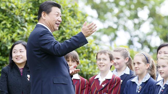 President Xi Jinping talks to students from Scotch Oakburn College at Hobart’s Government House during his visit to the state in 2014.