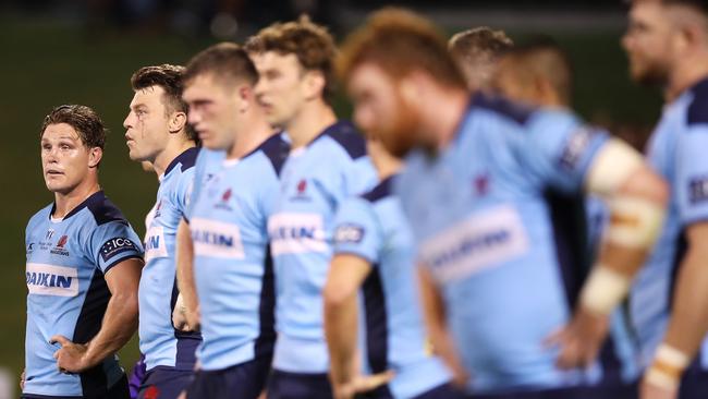 Michael Hooper of the Waratahs and his team look dejected after conceding yet another try to the Chiefs during round six. Picture: Mark Kolbe/Getty Images