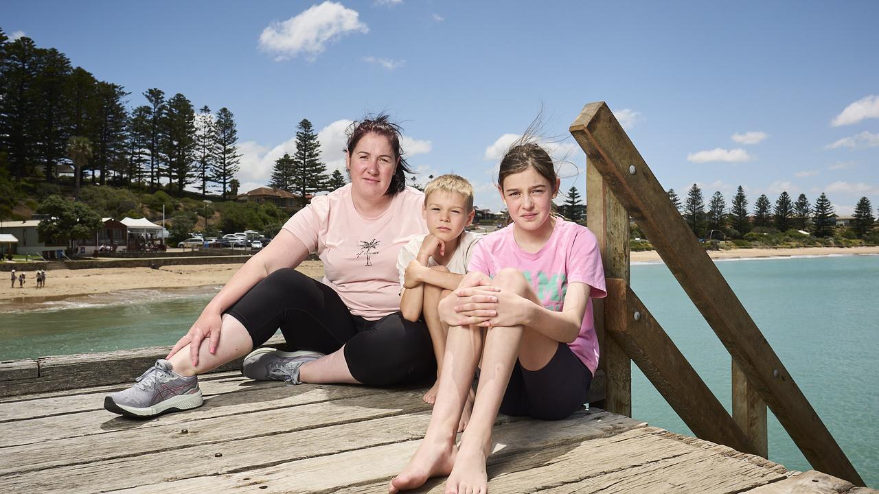 Port Elliot local Tara Gray with children Riley, 8, and 12, in Port Elliot, where the Horseshoe Bay pontoon has been removed. Picture: Matt Loxton