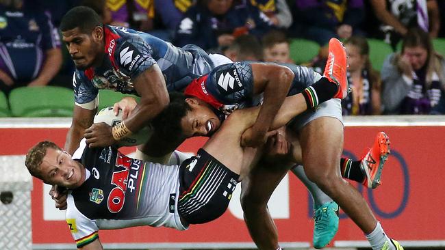 NRL: Round 5, Melbourne Storm v Penrith Panthers at AAMI Park, 1st April, Melbourne Australia. Matt Moylan of the Penrith Panthers gets stopped by Picture: George Salpigtidis