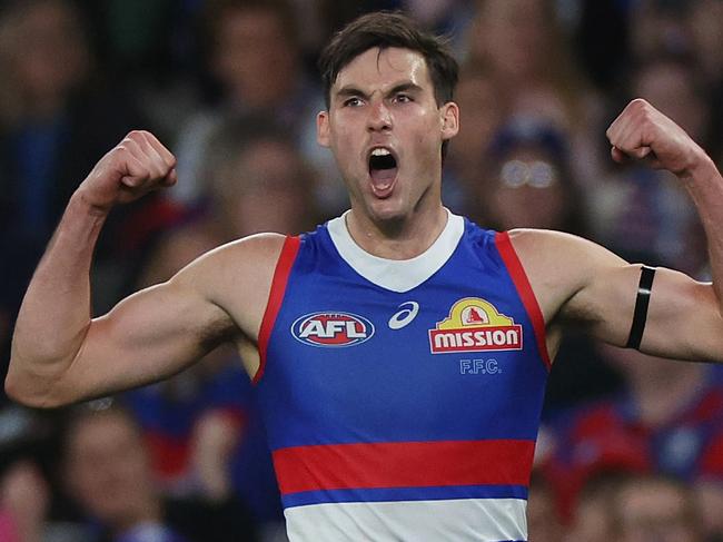 MELBOURNE, AUSTRALIA - AUGUST 18: Sam Darcy of the Bulldogs celebrates kicking a goal during the round 23 AFL match between Western Bulldogs and North Melbourne Kangaroos at Marvel Stadium, on August 18, 2024, in Melbourne, Australia. (Photo by Daniel Pockett/Getty Images)