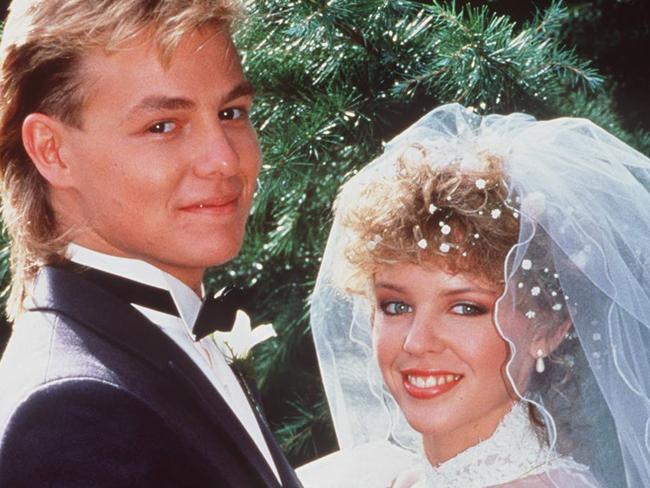 Scott Robinson (Jason Donovan) and Charlene Mitchell (Kylie Minogue) at their wedding on Neighbours.