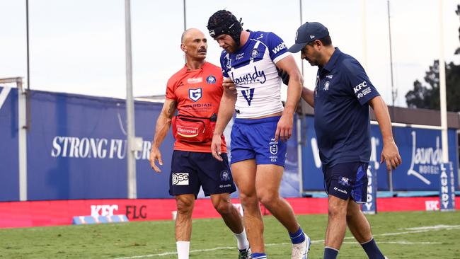 SYDNEY, AUSTRALIA - MARCH 16: Matt Burton of the Bulldogs walks off after sustaining an injury during the round two NRL match between Canterbury Bulldogs and Gold Coast Titans at Belmore Sports Ground, on March 16, 2025, in Sydney, Australia. (Photo by Jeremy Ng/Getty Images)