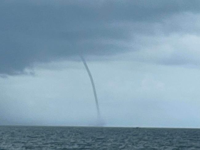 A waterspout in waters off Hervey Bay.