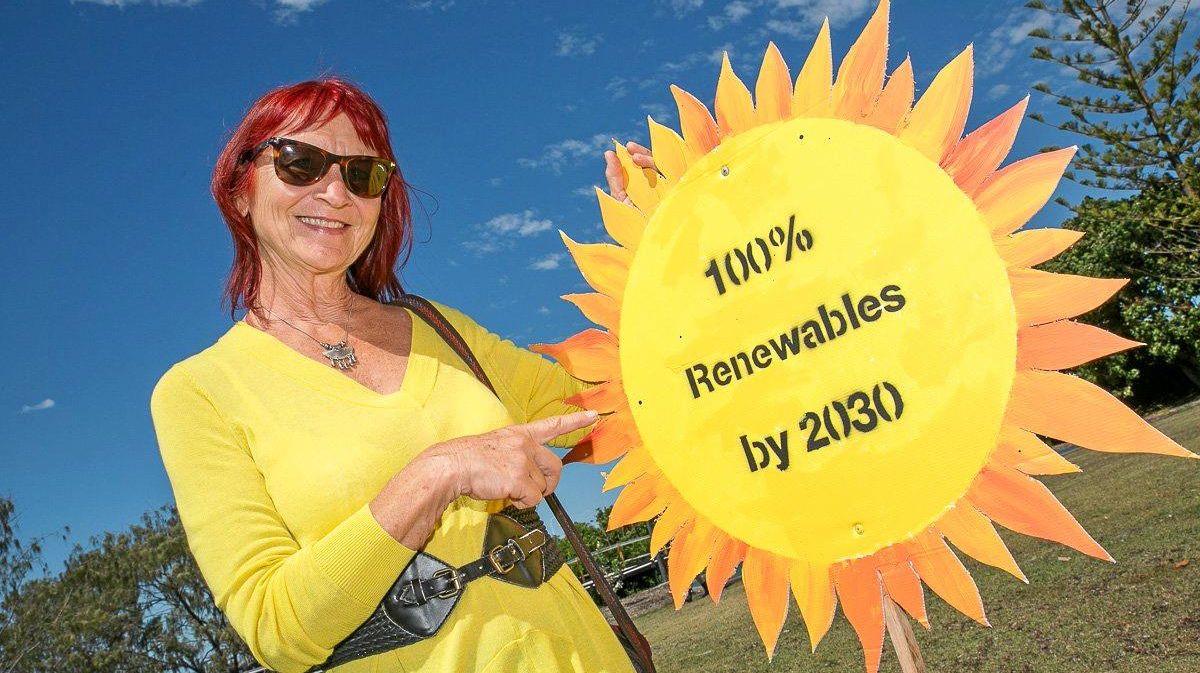 AROUND 200 anti-coal protesters dressed in yellow rallied at the Jetty foreshore in a show of 'community support' for renewable energy. Picture: Rob Cleary