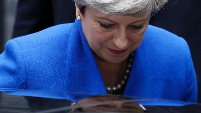 Theresa May leaves 10 Downing Street, en route to Buckingham Palace. Picture: AFP