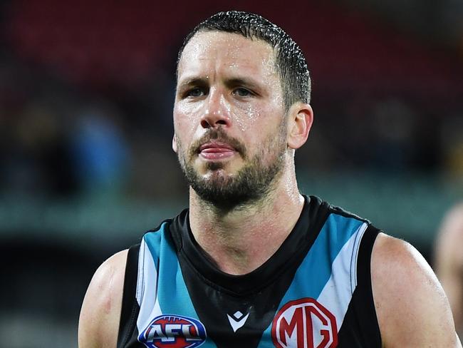 ADELAIDE, AUSTRALIA - AUGUST 06: Travis Boak of Port Adelaide  heads off the oval after losing the round 21 AFL match between the Port Adelaide Power and the Richmond Tigers at Adelaide Oval on August 06, 2022 in Adelaide, Australia. (Photo by Mark Brake/Getty Images)