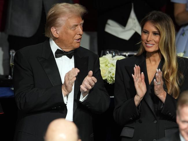 Republican presidential nominee former President Donald Trump and former first lady Melania Trump arrive for the 79th annual Alfred E. Smith Memorial Foundation Dinner, Thursday, Oct. 17, 2024, in New York. (AP Photo/Julia Demaree Nikhinson)