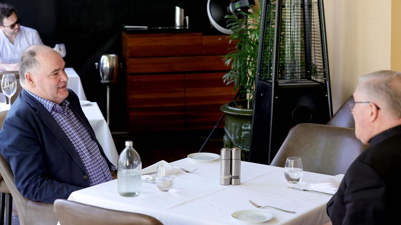 Archbishop Mark Coleridge being interviewed by Michael Madigan at Moo Moo Bar &amp; Grill. Picture: Steve Pohlner