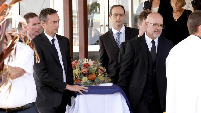 John Ahern (left) with coffin of his father, at the State Funeral Service for Mike Ahern AO, at Our Lady of the Rosary Catholic Church, Caloundra, on Friday 25th August 2023 - Photo Steve Pohlner