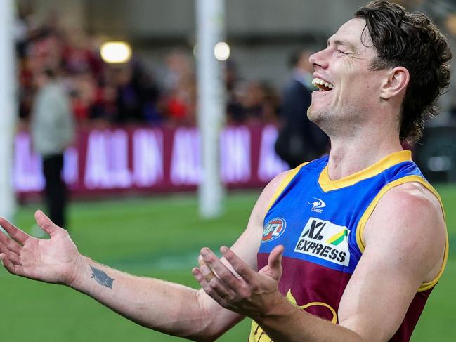 BRISBANE, AUSTRALIA - AUGUST 07: Lachie Neale of the Lions acknowledges the crowd after the 2022 AFL Round 21 match between the Brisbane Lions and the Carlton Blues at The Gabba on August 7, 2022 in Brisbane, Australia. (Photo by Russell Freeman/AFL Photos via Getty Images)