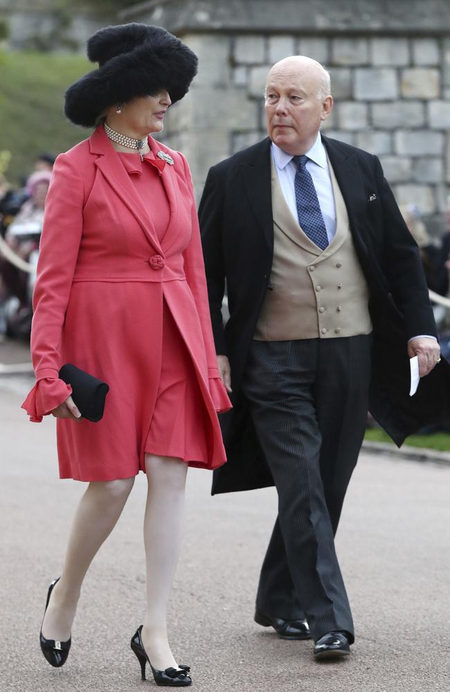 Emma Joy Kitchener and Julian Fellowes. Sis did you swipe one of the guard’s hats? Picture: AP