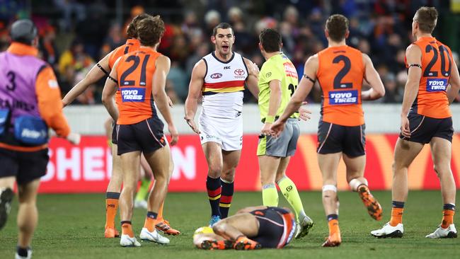 Taylor Walker remonstrates with the umpire after his tackle on Josh Kelly that could bring a premature end to the Crows captain’s season. Picture: Matt King/AFL Media/Getty Images