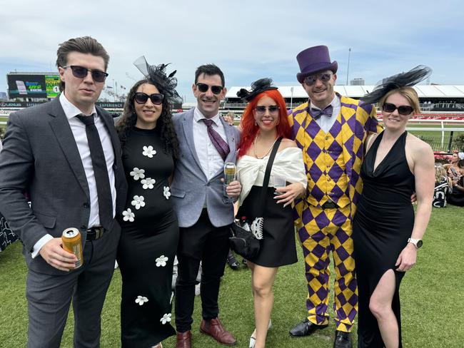 Leo Taylor, Krista James, Mitchell Alexander, Erica Bermudez, Danny Lauer and Tiffany Mar at Flemington for Derby Day on November 2, 2024. Picture: Phillippa Butt