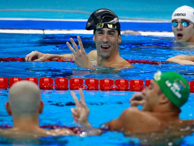 RIO DE JANEIRO, BRAZIL - AUGUST 12: Michael Phelps of the United States reacts after winning joint silver in the Men's 100m Butterfly Final on Day 7 of the Rio 2016 Olympic Games at the Olympic Aquatics Stadium on August 12, 2016 in Rio de Janeiro, Brazil. (Photo by Adam Pretty/Getty Images)