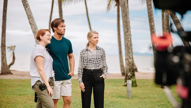 Director Christine Luby, and actors Liam McIntyre and Saskia Hampele on set of rom-com This Little Love of Mine, which has begun filming in Cairns. Picture: Supplied.