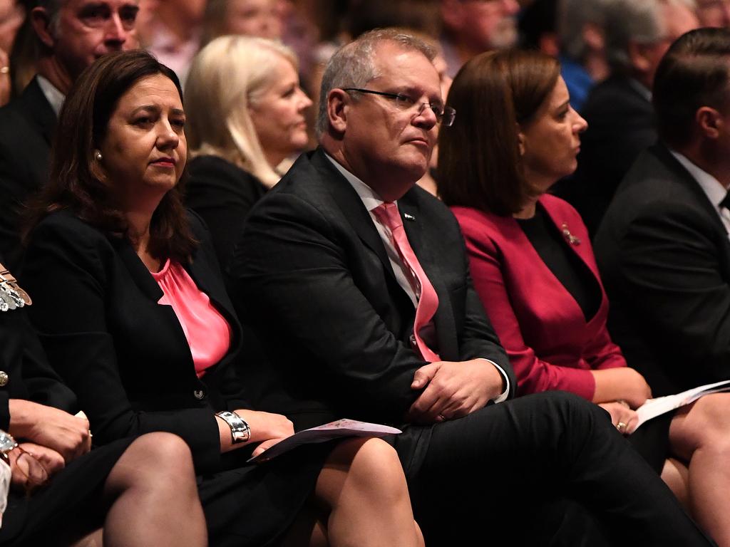 Scott Morrison sits between Queensland Premier Annastacia Palaszczuk and Opposition Leader Deb Frecklington at the funeral. Picture: Dan Peled.