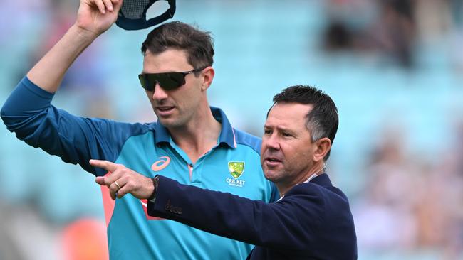 Ricky Ponting teaching Pat Cummins everything he knows. Photo by Stu Forster/Getty Images.