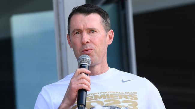 Magpies head coach Craig McRae speaks on stage during the Collingwood Magpies AFL Grand Final celebrations fan day at AIA Centre on October 01, 2023 in Melbourne, Australia. (Photo by Quinn Rooney/Getty Images)