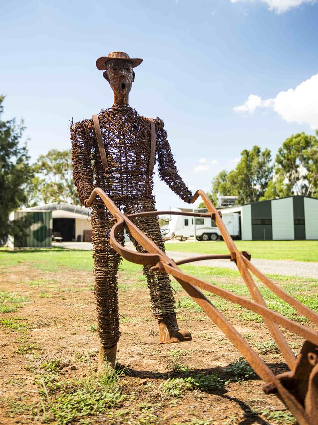 History: The wire version of Jack Orr with the original plough. Picture: Dannika Bonser