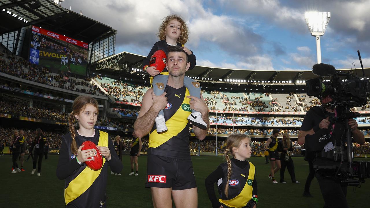 A teary Cotchin walking a lap of honour with his family after playing his final game in round 23 this year against North Melbourne. (Photo by Daniel Pockett/Getty Images)