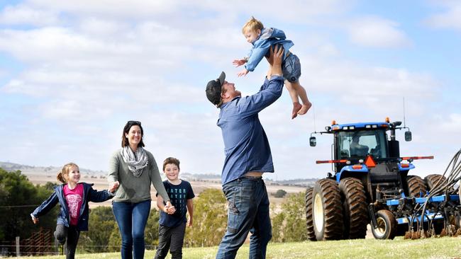 Mark and Rachael McInerney, pictured with their children Stella, 6, Cooper, 8, and Charlie, 2 have had a great start to the season after receiving between 40 to 50mm on their Mid North properties in the past week. Picture: Tricia Watkinson