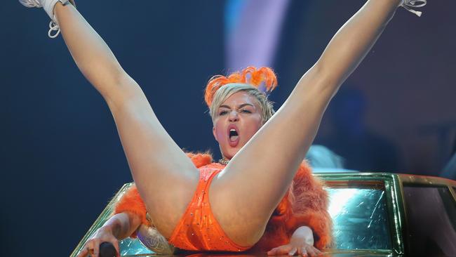 Open up ... Miley strikes a favourite pose. Picture: Scott Barbour/Getty Images